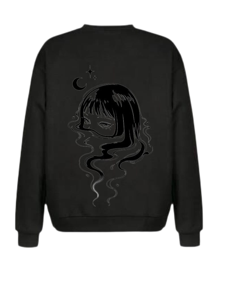 A black crewneck sweatshirt shown from the back, featuring a dark graphic print of a girl's face with flowing hair and a crescent moon under a star.